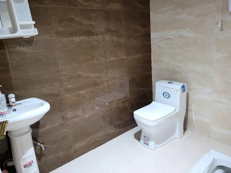 آپارتمان ۱۱۷ متری طبقه ۷ برج بهارستان رو به بلوار-8